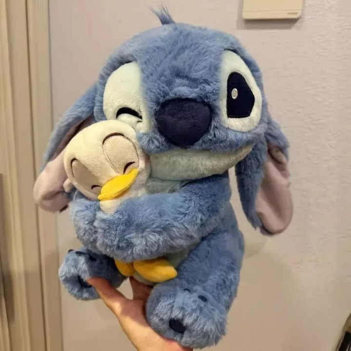 Boneco de pelúcia Stitch com Amigo Pato
